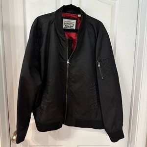 Levi’s black bomber jacket. In great condition.